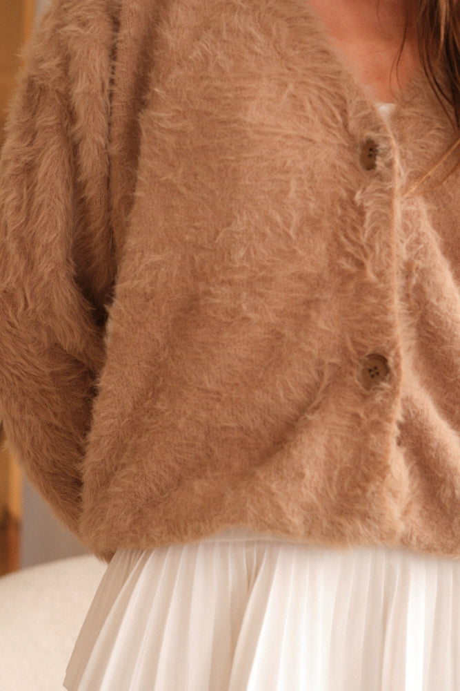 Latte knit cardigan close up texture detail